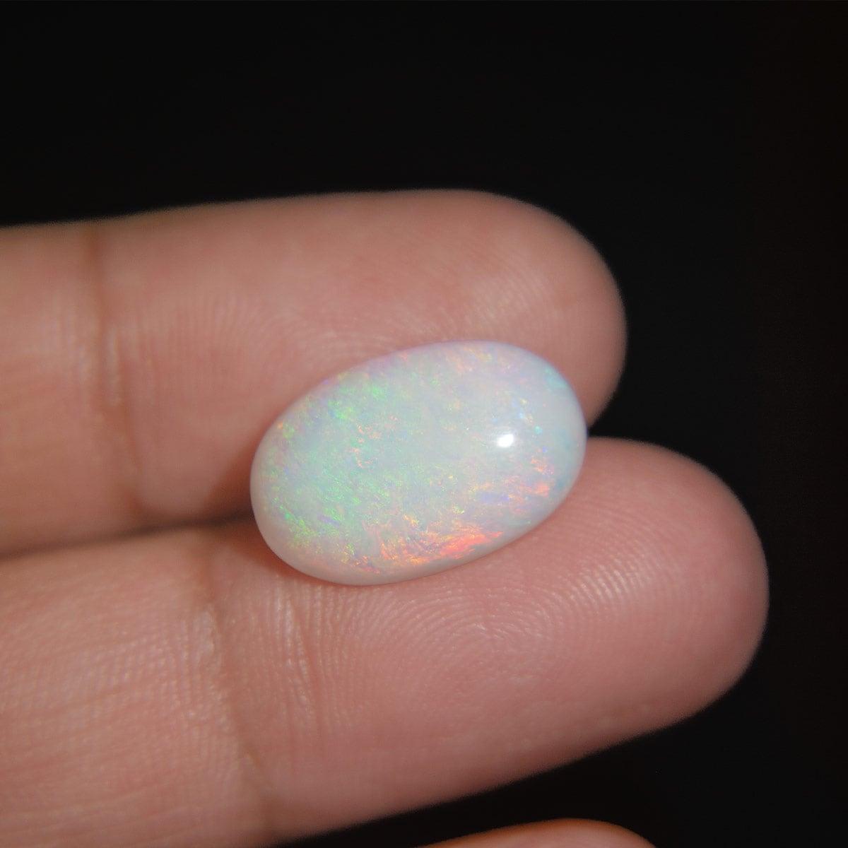 White Opal With Fire - 6.61 Carat